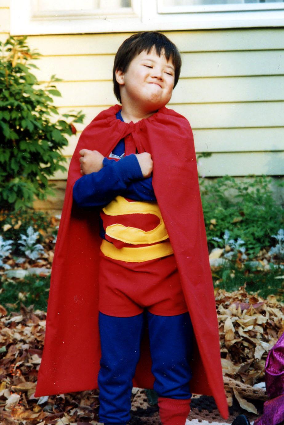 Young Zoey dressed as Superman